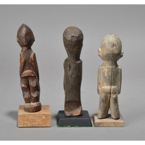 220 - Three Lobi standing male figures, Burkina Faso one with string tied around his ankles, 14cm, 14.5cm ... 