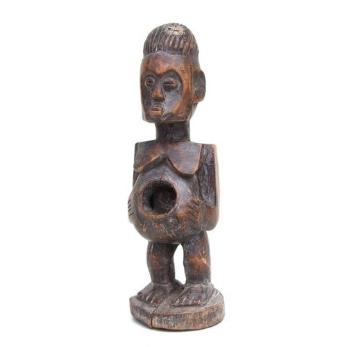 227 - African Art / Tribal Art:  a pair of carved wooden Lobi male and female figures , each 31cms high. (... 