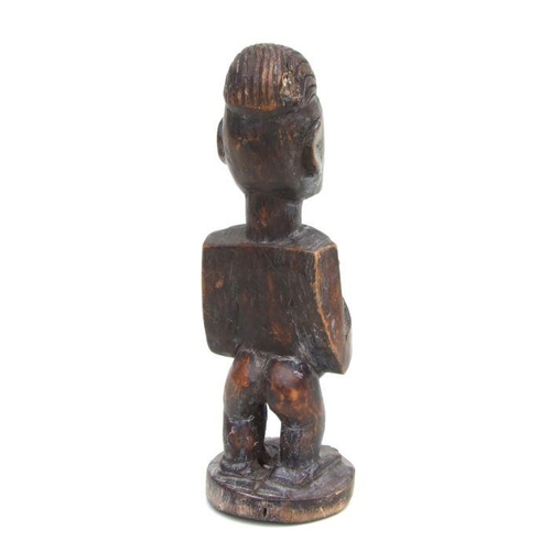 227 - African Art / Tribal Art:  a pair of carved wooden Lobi male and female figures , each 31cms high. (... 