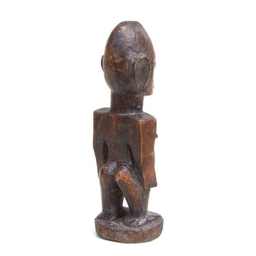 227 - African Art / Tribal Art:  a pair of carved wooden Lobi male and female figures , each 31cms high. (... 