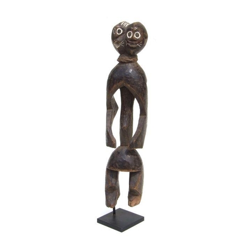 246 - African Art / Tribal Art:  a Mumuye (Lagalagana) standing figure with two heads, mounted on a stand,... 