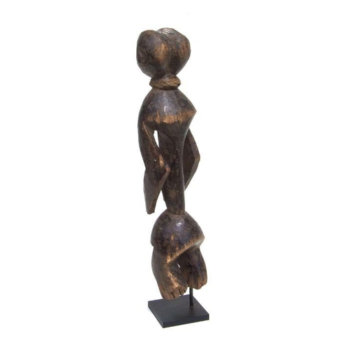 246 - African Art / Tribal Art:  a Mumuye (Lagalagana) standing figure with two heads, mounted on a stand,... 