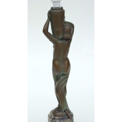 260 - An Art Deco bronzed spelter table lamp in the form of a naked girl carrying an urn, on a marble base... 