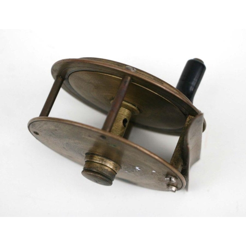 275 - An FT Williams & Co. brass fishing reel, 7.5cms diameter.