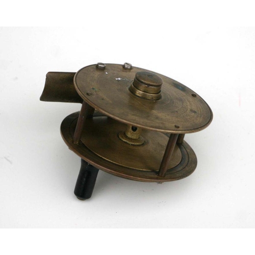 275 - An FT Williams & Co. brass fishing reel, 7.5cms diameter.