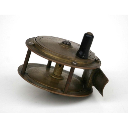 275 - An FT Williams & Co. brass fishing reel, 7.5cms diameter.