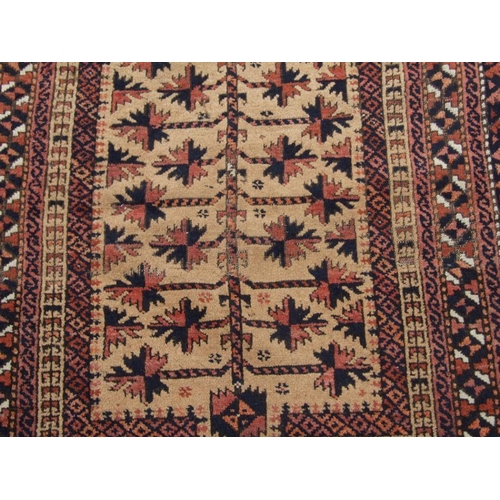 278 - A Persian Baluch tree prayer rug on a beige ground, 154 by 91cms; together with a small hand knotted... 