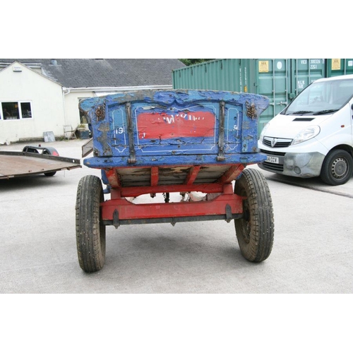 3 - A traditional horse drawn tipping cart with painted decoration, artillery type wheels, wooden shafts... 