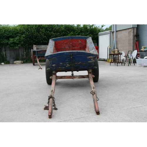 3 - A traditional horse drawn tipping cart with painted decoration, artillery type wheels, wooden shafts... 