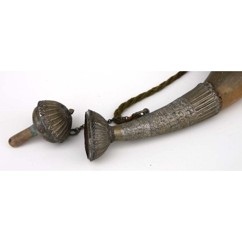 396 - A large Middle Eastern metal mounted ox horn, 53cms long.