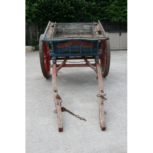 4 - A traditional horse drawn tipping cart with wooden shafts, steel and wooden cartwheels and bears pla... 