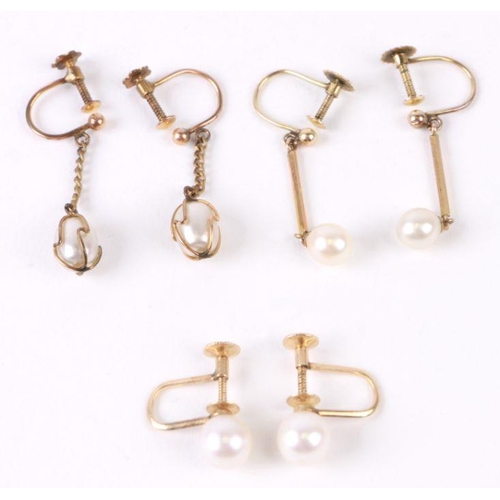 757 - A pair of 14ct gold Mikimoto pearl screw-back earrings; together with a pair of 9ct gold screw back ... 