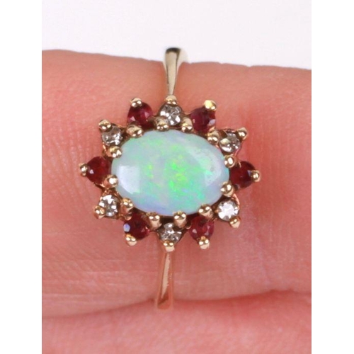 766 - A 9ct gold opal, ruby and diamond cluster ring, approx UK size 'N', 2.5g.