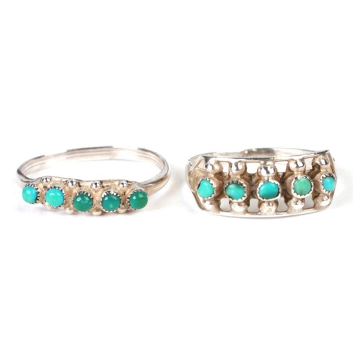 773 - Two Navajo Native American turquoise set white metal rings, one signed 'Zuni' (2).