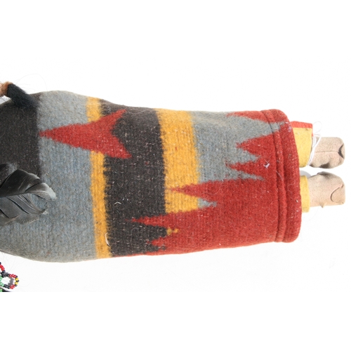 243 - North American / Tribal Art:  an early 20th century Native American Skookum doll with painted compos... 