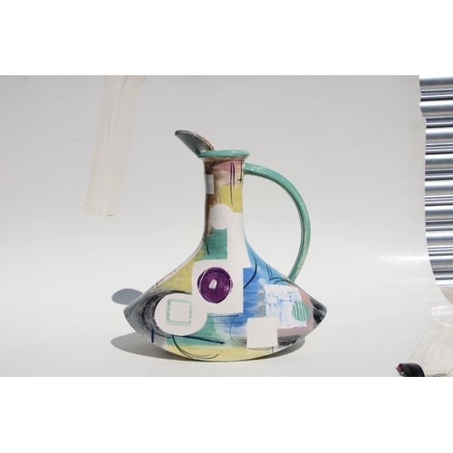 104 - A large Paul Jackson Studio pottery jug with multi-colour abstract design, signed & dated '15 to the... 