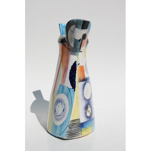 105 - A large Paul Jackson Studio pottery jug with multi-colour abstract design, signed and dated '16 to t... 