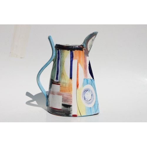 105 - A large Paul Jackson Studio pottery jug with multi-colour abstract design, signed and dated '16 to t... 