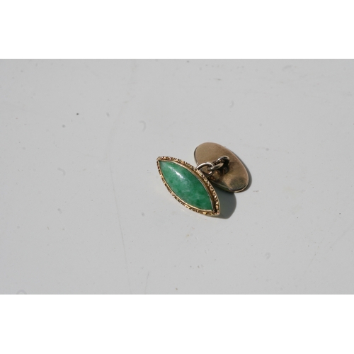 774 - A pair of Chinese 18ct gold and jade cufflinks of navette form.