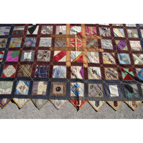 282 - A patchwork wall hanging, 135 by 198cms.