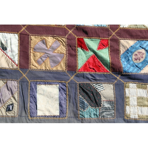 282 - A patchwork wall hanging, 135 by 198cms.