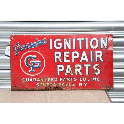 411 - An enamel tin sign 'Ignition Repair Parts' 47 by 26cms.