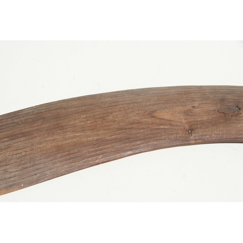 199 - An Australian Aboriginal boomerang with simple decoration, 77cms long.