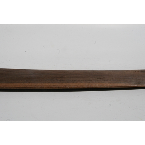 199 - An Australian Aboriginal boomerang with simple decoration, 77cms long.