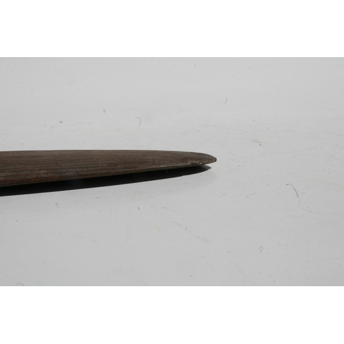 199 - An Australian Aboriginal boomerang with simple decoration, 77cms long.