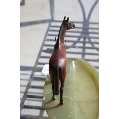 419 - A large Austrian cold painted bronze horse mounted on a green onyx ashtray base, makers mark to unde... 