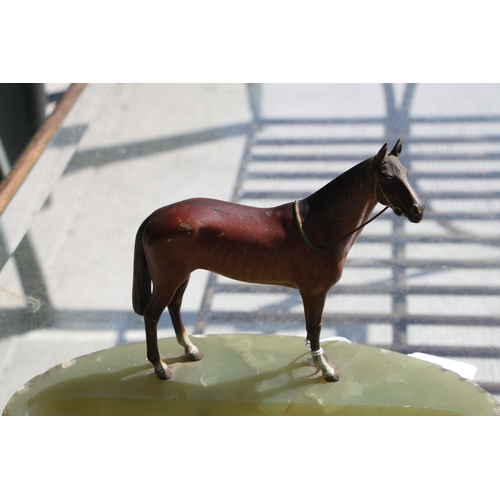 419 - A large Austrian cold painted bronze horse mounted on a green onyx ashtray base, makers mark to unde... 