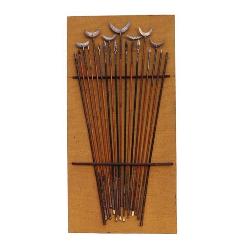 101 - A display of Indo-Persian Mughal steel headed arrows mounted on a board, each approx 82cms long.