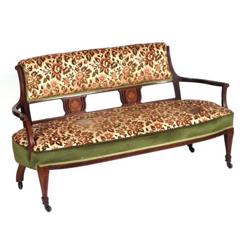 1015 - An Edwardian upholstered rosewood parlour suite comprising three-seater sofa and four matching chair... 