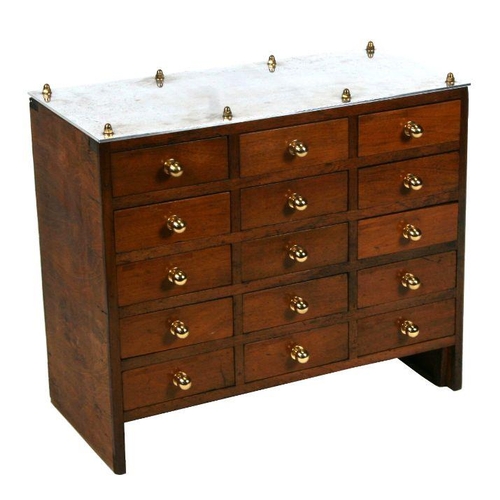 1022 - A walnut bank of fifteen drawers with chromed top and brass handles, 68cms wide.