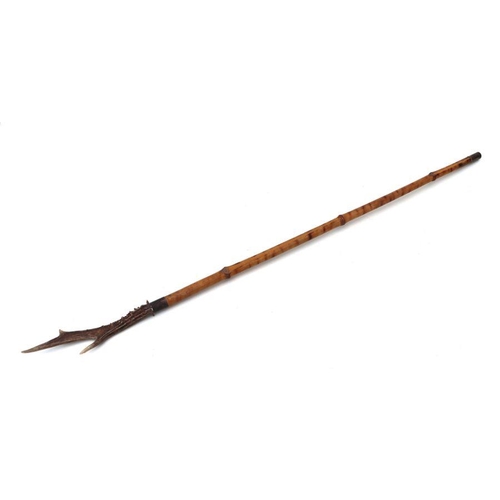 137 - A bamboo shafted sword stick with a 47cms (18.5ins) square section blade and stag horn handle. Maker... 