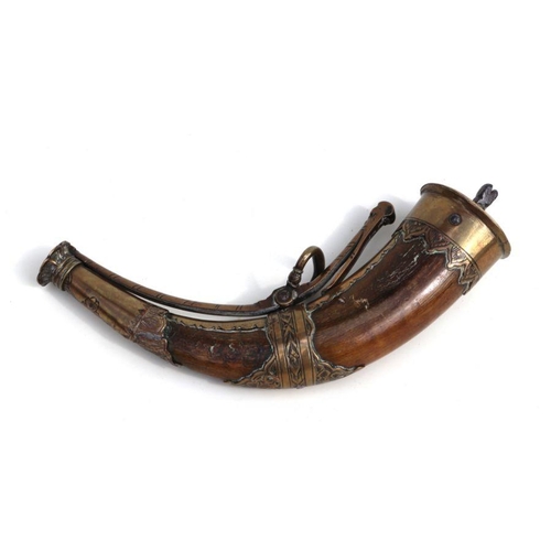 143 - An 18th / 19th century German brass mounted horn powder flask, 21cms wide.