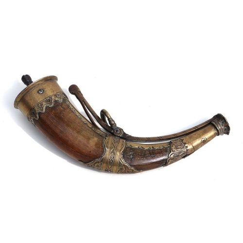 143 - An 18th / 19th century German brass mounted horn powder flask, 21cms wide.