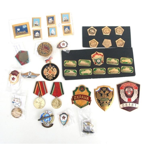 146 - A set of six Soviet Space Programme aluminium lapel pins; together with similar Russian enamel gilt ... 