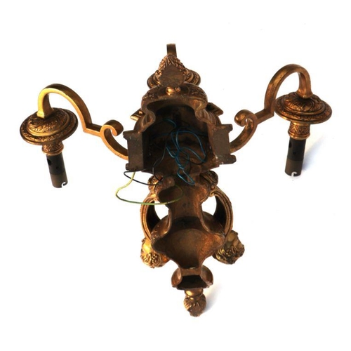 149 - Two of cast brass rococo style wall lights, one two arm the other three arm. 45cms high (2).