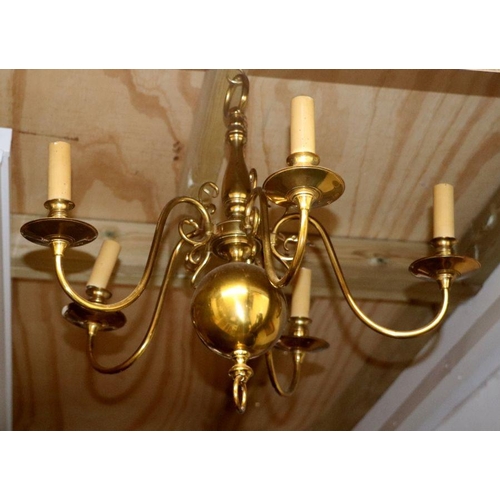 157 - A Dutch style five-branch brass chandelier, 55cms wide.