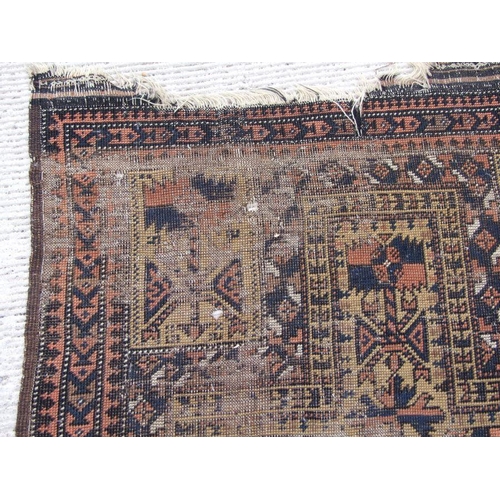 186 - A Persian Balouch hand knotted prayer rug with geometric design, on a beige ground, 154 by 86cms.