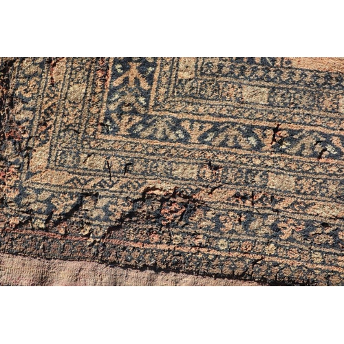 198 - A Persian rug with repeating guls on a brown ground within a multi border, 204 by 130cms.Condition R... 