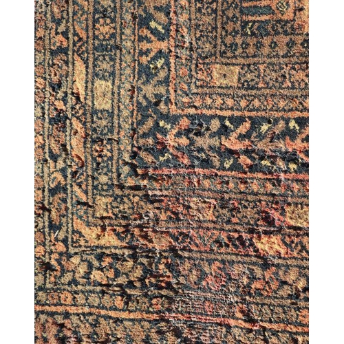 198 - A Persian rug with repeating guls on a brown ground within a multi border, 204 by 130cms.Condition R... 