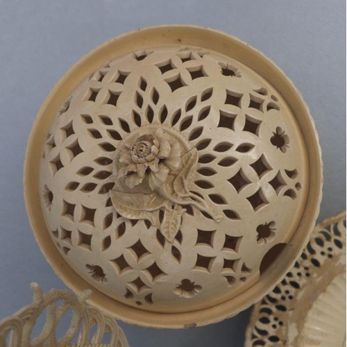 345 - A Belleek porcelain lattice work shallow dish, 25cms diameter; together with Leeds creamware style r... 