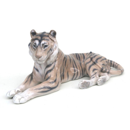 351 - A Royal Copenhagen figure of a recumbent tiger, model no. 714, 31cms long.