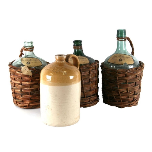 485 - A White & Sons of Newbury stoneware flagon, 31cms high; together with three continental wicker cased... 