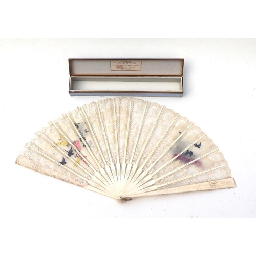 487 - A late 19th century carved bone and painted lace fan decorated with birds and flowers, 35cms long, i... 