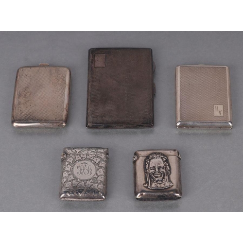 532 - An early 20th century silver cigarette case with engine turned decoration, Birmingham 1929; together... 