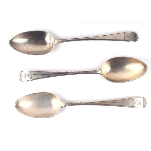 534 - Three George III tablespoons, crested, London 1784, 22cms long, 204g (3).