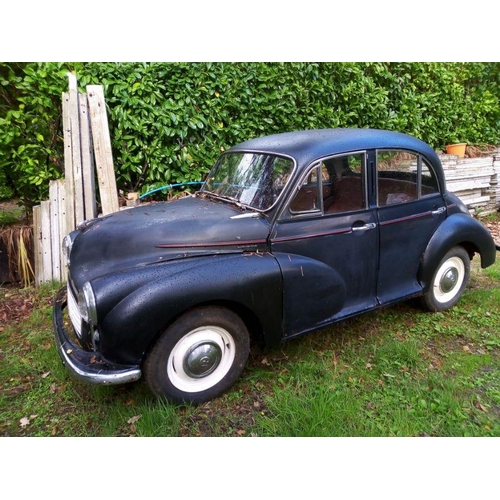 63 - A 1960 Morris Minor four door saloon, registration no. 614 XER, 13/04/60. 948cc, black.   An extreme... 